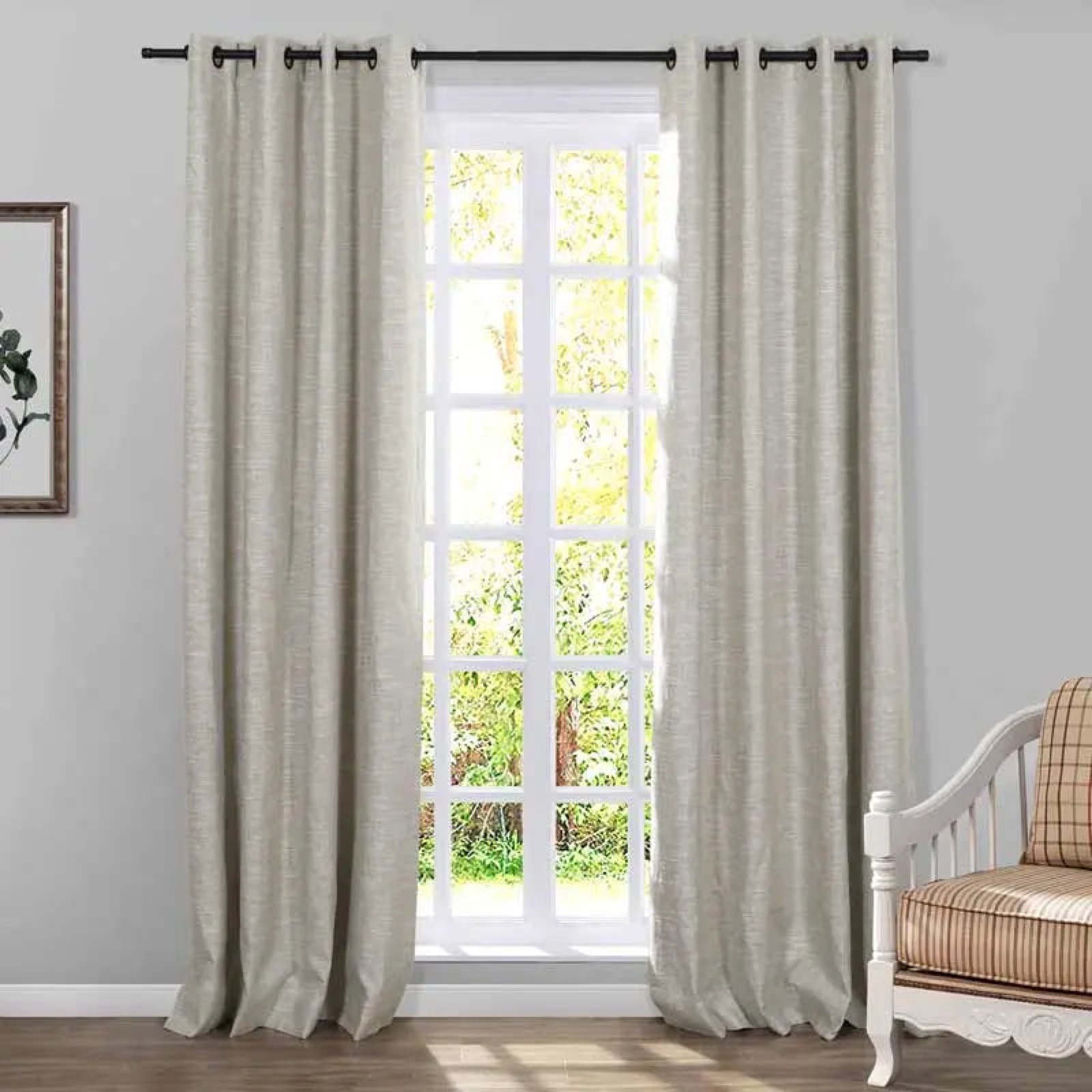 Jawara Luxury Linen Cotton oatmeal grommet curtains framing a window